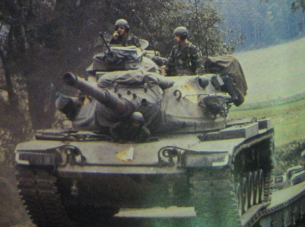 From Air Man, tanks cross a bridge during the war game.