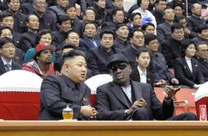 Kim Jong-un and Dennis Rodman catch a basketball game together. KCNA/AFP/GETTY IMAGES