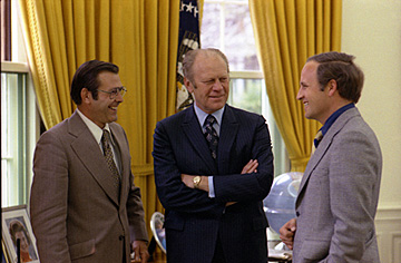 President Gerald Ford (center) with White House Chief of Staff Donald Rumsfeld (left), and Rumsfeld’s assistant, Dick Cheney, in the Oval Office, April 28, 1975. (Source: David Hume Kennerly, photographer; courtesy Gerald R. Ford Library)