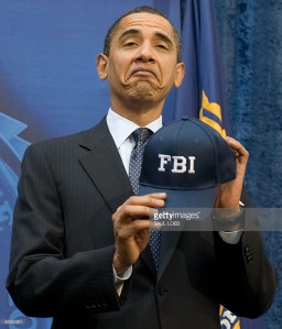 Don't blame the President for making this face in 2009 after then-FBI director Mueller gave him this hat as a gift. AFP PHOTO / Saul LOEB