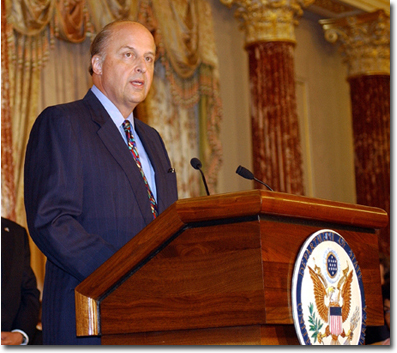 John Negroponte speaks at his swearing in ceremony as new U.S. Ambassador to Iraq on June 23, 2004. (Source: U.S. State Department) 