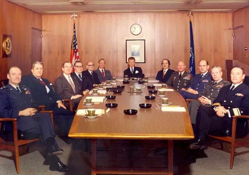 Taken in November 1973, this picture of the U.S. Intelligence Board, then chaired by Director of Central Intelligence William E. Colby, shows representatives of the organizations which collected and reviewed intelligence before and during the October 1973 War. INR Director, Ray Cline, who signed the memorandum predicting war by the autumn, sits fourth from left clockwise . (Photo, courtesy CIA History Staff)